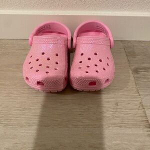 Glittery pink toddler crocs